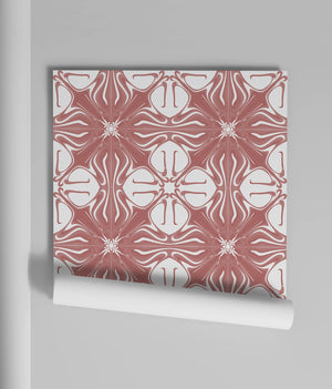 Santorini Tile wallpaper by Liberty James Studio in pink and white, partly unrolled roll showing