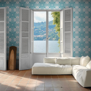 Santorini Tile wallpaper by Liberty James Studio in pale blue and white, a Mediterranean tile pattern in a bathroom setting