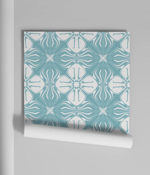 Santorini Tile wallpaper by Liberty James Studio in pale blue and white, a Mediterranean tile pattern in a dining area