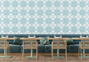 Santorini Tile wallpaper by Liberty James Studio in pale blue and white, a Mediterranean tile pattern in a living room