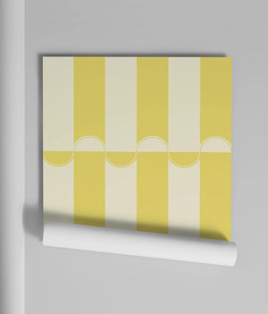 Scallop Lane wallpaper by Liberty James Studio in yellow and cream, scalloped stripes in a living room