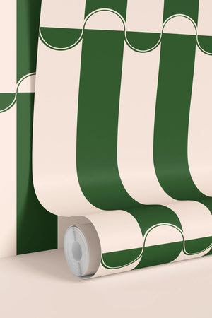 Scallop Lane wallpaper by Liberty James Studio in green, sample roll showing scalloped stripes