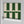 Scallop Lane wallpaper by Liberty James Studio in green, roll showing scalloped stripes