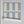Scallop Lane wallpaper by Liberty James Studio in blue, sample roll showing scalloped stripes