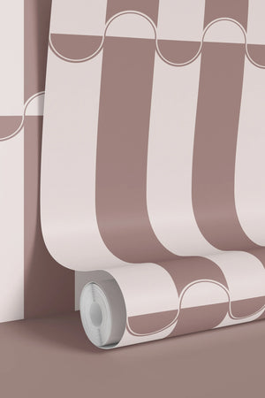 Scallop Lane wallpaper by Liberty James Studio in pink, sample roll showing scalloped stripes