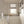 Scallop Lane wallpaper by Liberty James Studio in grey, scalloped stripes in a kitchen