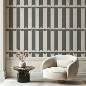 Scallop Lane wallpaper by Liberty James Studio in charcoal and white, scalloped stripes in a living room