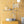 Popsicle wallpaper by Liberty James Studio in yellow, wavy popsicle stripes on a bathroom wall
