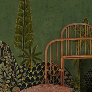 The Garden of Lila wallpaper by Deus ex Gardenia in dark green, a tall forest mural in a styled room setting
