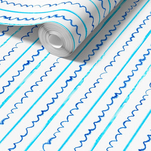 Sea Lines Stripe wallpaper by Seed Home Designs in blue and white, roll showing fine watercolour stripes