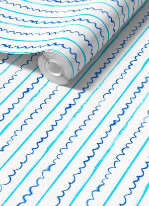 Sea Lines Stripe wallpaper by Seed Home Designs in blue and white, roll showing fine watercolour stripes