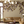 Seasons of the Vine wallpaper by Dami and Em Design in cream, grape vines on a living room wall