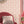 Shell Seekers wallpaper by Liberty James Studio in pink, a scallop shell pattern in a living room