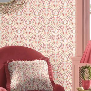 Shell Seekers wallpaper by Liberty James Studio in pink, a scallop shell pattern in a living room