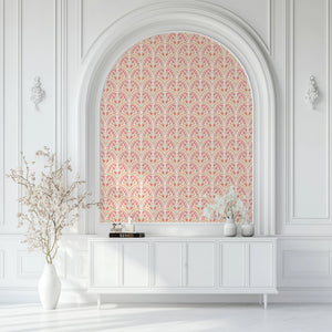 Shell Seekers wallpaper by Liberty James Studio in pink, a scallop shell pattern above a sideboard