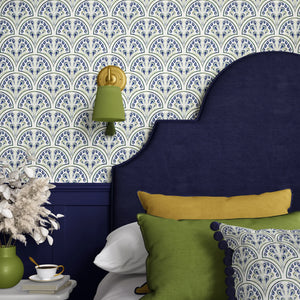 Shell Seekers wallpaper by Liberty James Studio in blue, a scallop shell pattern in a bedroom