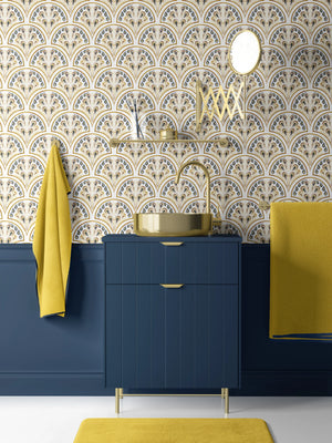 Shell Seekers wallpaper by Liberty James Studio in blue and yellow, a scallop shell pattern behind a console table