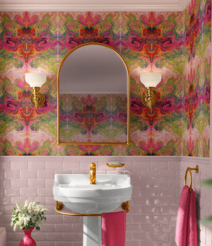 Siesta Key wallpaper by Liberty James Studio in pink and green, a marbled mirrored design in a bathroom