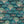 Silk Shades wallpaper by Brand McKenzie in teal, pattern detail of layered silk lampshades