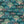 Silk Shades wallpaper by Brand McKenzie in teal, close view of layered silk lampshades
