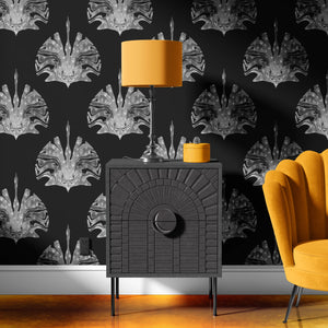 Leopard Crane wallpaper by Liberty James Studio in silver, mirrored cranes and leopards behind a sofa in a living room