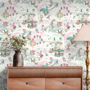 Sky Fair wallpaper by Brand McKenzie in pink, a pastel sky fair behind a console table