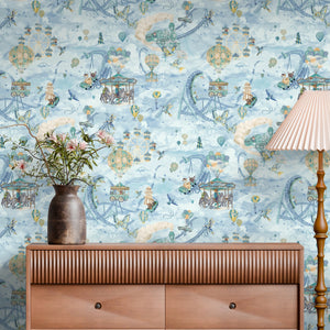 Sky Fair wallpaper by Brand McKenzie in blue, a pastel sky fair above a cabinet