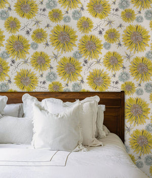 Sunflower and Flora wallpaper by Seed Home Designs in yellow and green, large sunflowers in a bedroom