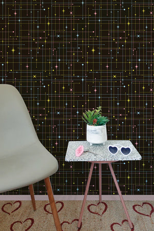Star-Crossed wallpaper by Dupenny in black, a star-crossed grid on a feature wall