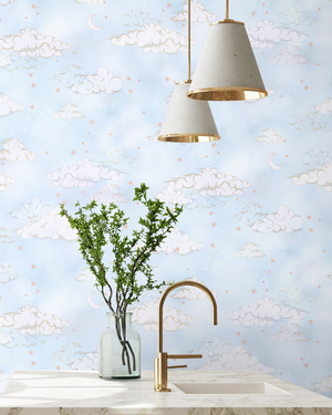 Starry Clouds wallpaper by Brand McKenzie in pale blue, soft clouds and stars behind bar stools