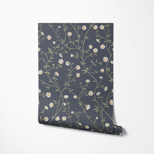 Daisy Chain wallpaper by Studio Le Cocq in navy, roll showing trailing daisy chains