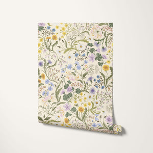 The Lost Garden Cottage wallpaper by Studio Le Cocq in cream, roll showing a dense garden of flowers