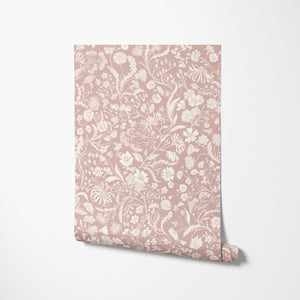 The Lost Garden wallpaper by Studio Le Cocq in pink, sample roll showing a dense garden of flowers