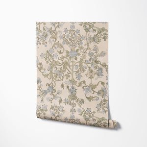 Tudor Blooms wallpaper by Studio Le Cocq in beige, partly unrolled roll showing Tudor-style flower urns