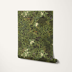 Woodland Floor wallpaper by Studio Le Cocq in dark green, roll showing woodland flowers and ferns