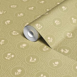 Cottage Ditsy Dot wallpaper by Studio Le Cocq in green, roll showing ditsy flowers in dotted circles