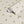 Cottage Ditsy wallpaper by Studio Le Cocq in green, roll showing scattered ditsy flowers