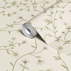 Daisy Chain wallpaper by Studio Le Cocq in cream, partly unrolled roll showing trailing daisy chains