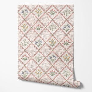 First Signs wallpaper by Studio Le Cocq in brown, sample roll showing a floral trellis