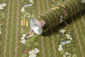Hedgerows wallpaper by Studio Le Cocq in olive green, sample roll showing hedgerow flowers and birds in stripes