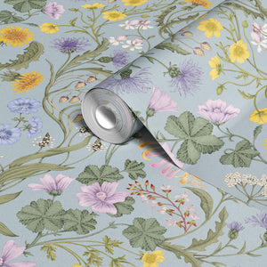 The Lost Garden in Coastal Blue wallpaper by Studio Le Cocq in blue, roll showing a dense garden of flowers
