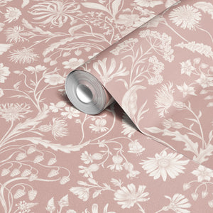 The Lost Garden wallpaper by Studio Le Cocq in pink, roll showing a dense garden of flowers