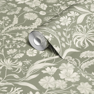 The Lost Garden wallpaper by Studio Le Cocq in terracotta, sample roll showing a dense garden of flowers