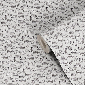 Sunflower Seed wallpaper by Seed Home Designs in black, roll showing sunflower seeds