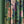 Swallows and Blooms velvet by Tatie Lou in green, swallows and peonies hung as curtains