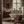 Swallows and Blooms wallpaper by Tatie Lou in rust, swallows and peonies in a bathroom
