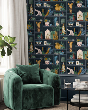 The Cabinet wallpaper by Brand McKenzie in navy and mustard, a cabinet of curiosities in a living room