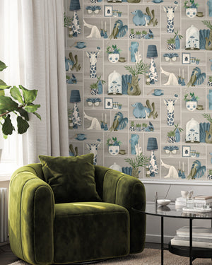 The Cabinet wallpaper by Brand McKenzie in grey and blue, a cabinet of curiosities on a living room wall