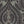 The Great Damask wallpaper by Brand McKenzie in charcoal, detail of a large-scale damask
