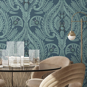 The Great Damask wallpaper by Brand McKenzie in teal, a large-scale damask behind a dining table